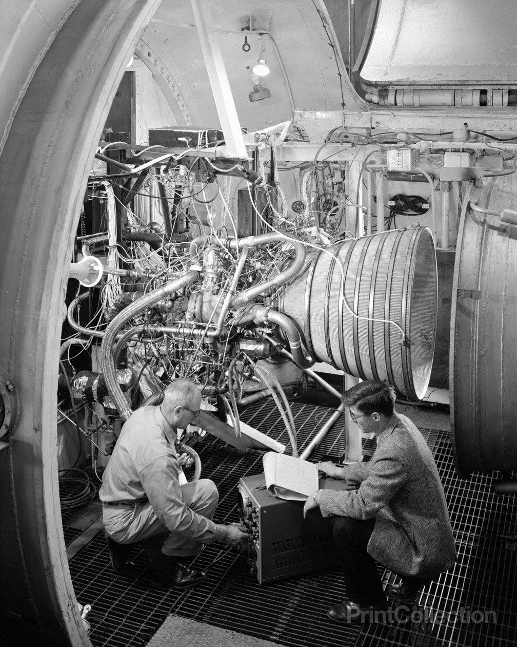Engineers Working on Pratt and Whitney Rocket Engine: 8" x 10"