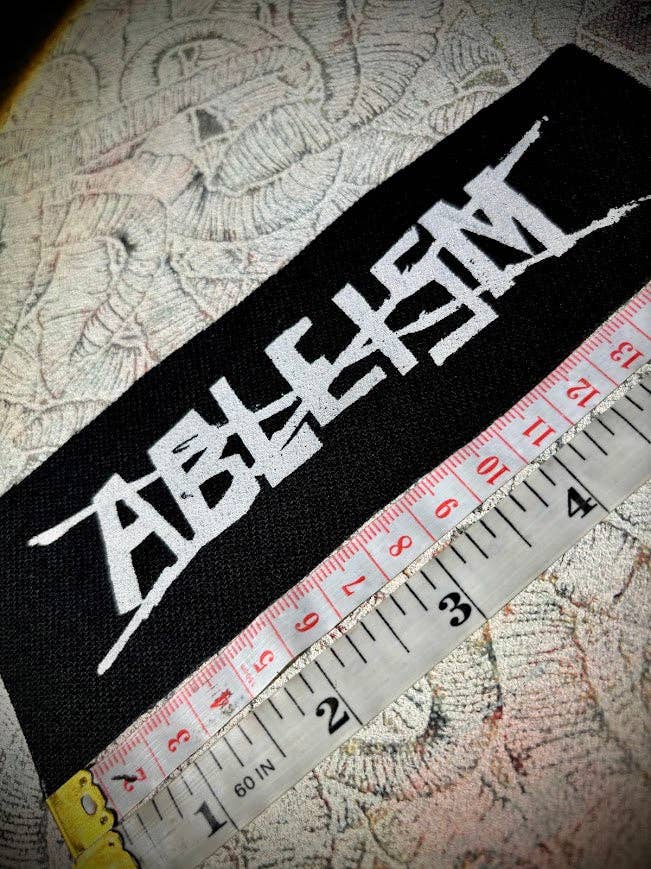 Stop ableism patch.: Black w/white ink