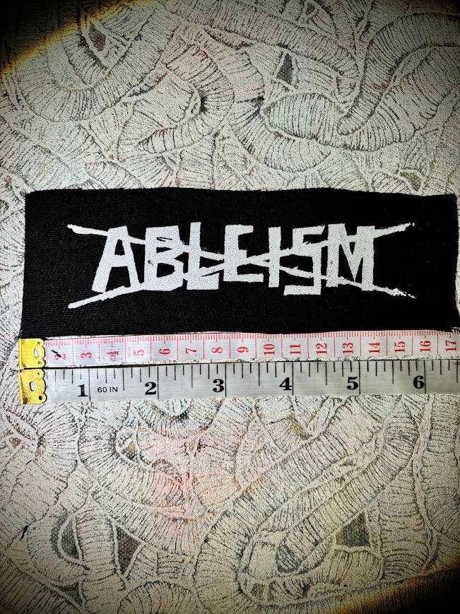 Stop ableism patch.: Black w/white ink